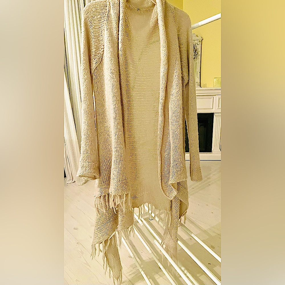 Boho oatmeal asymmetrical cardigan with fringe.